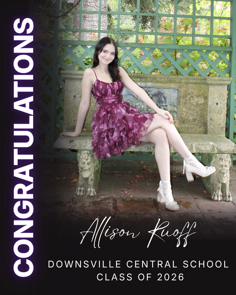 student posing for formal photo