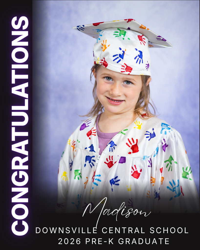 child in cap and gown