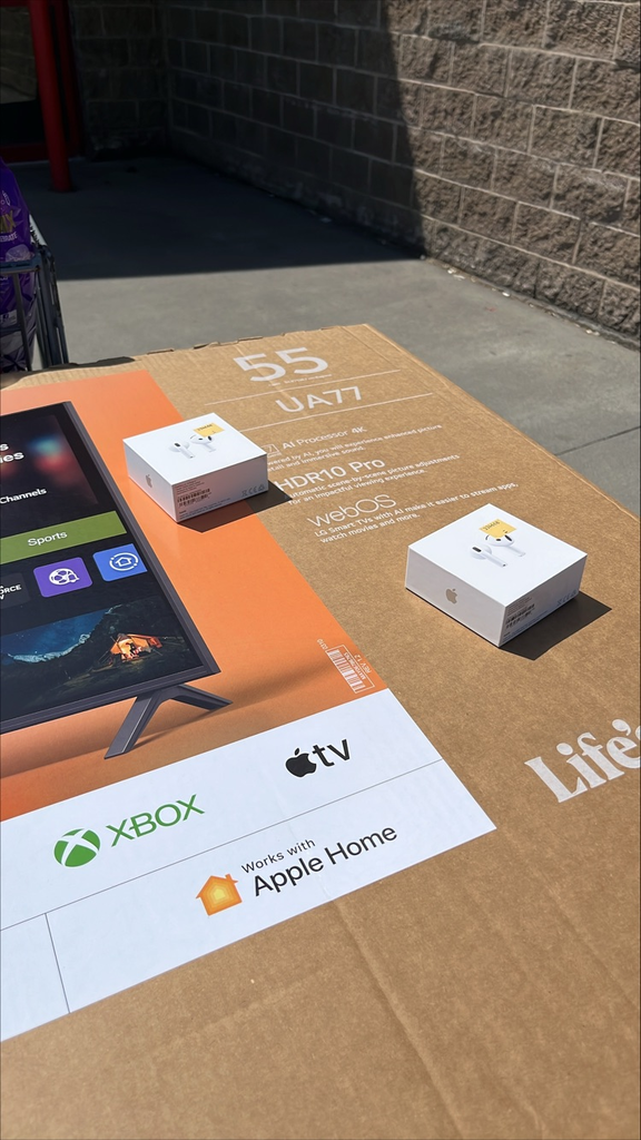 photo of tv in box and AirPods