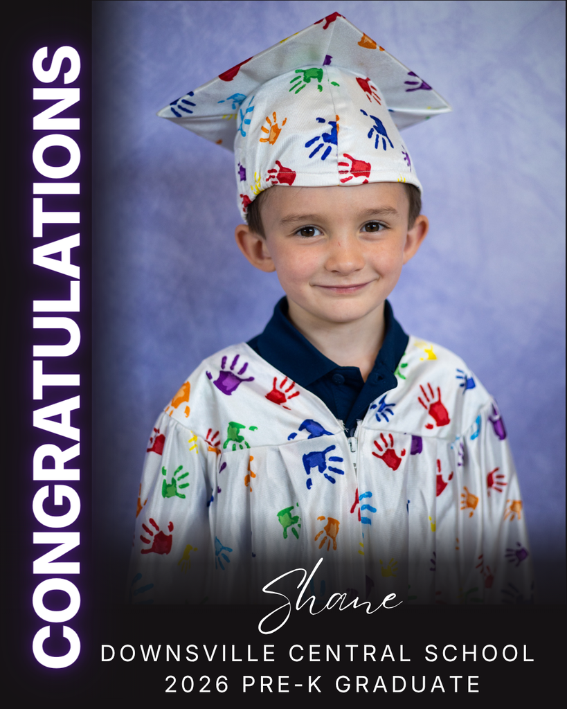 child in cap and gown