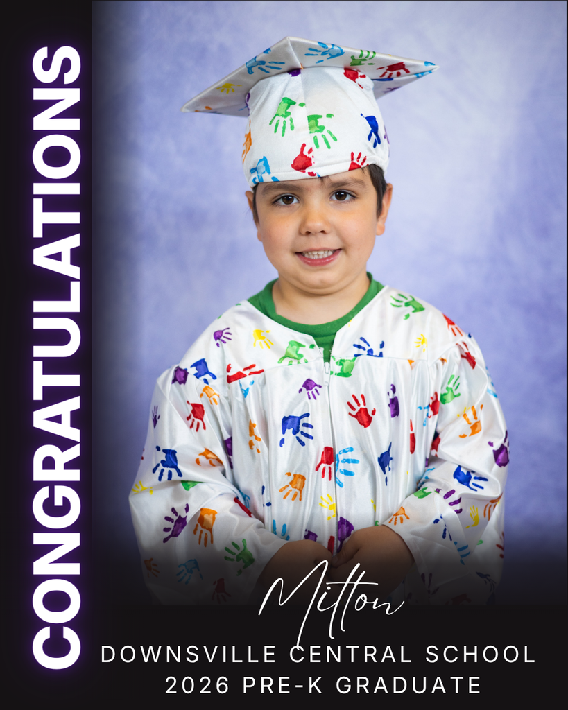 child in cap and gown