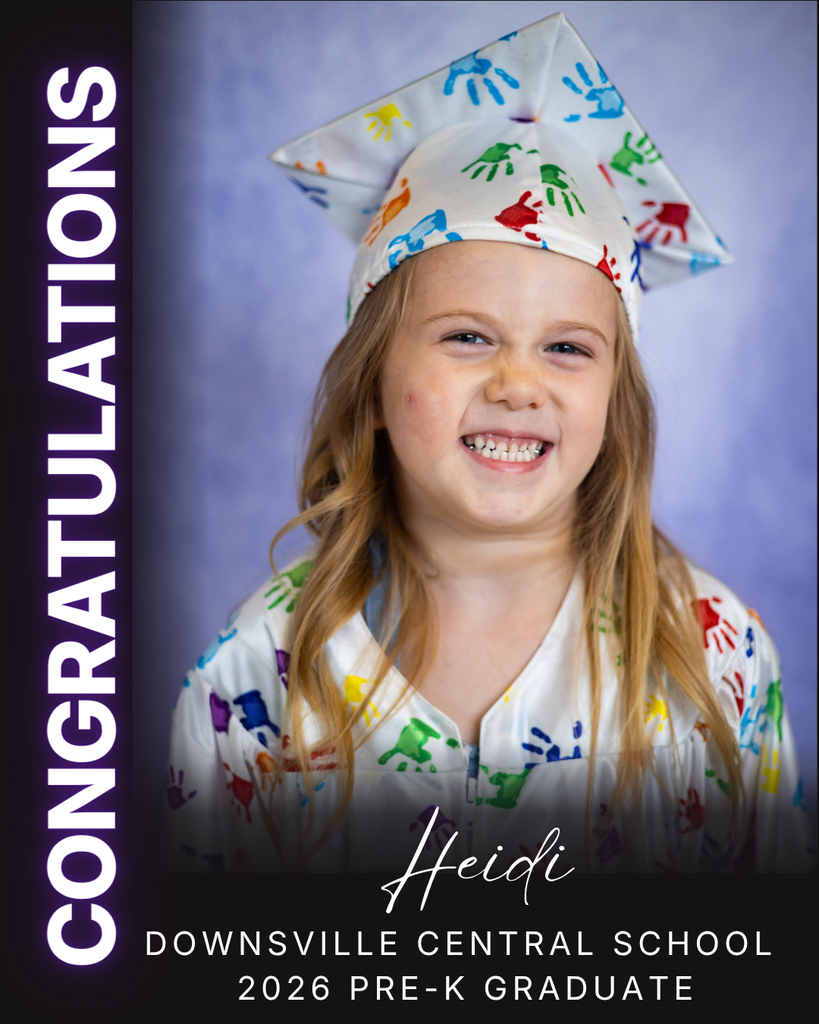 child in cap and gown