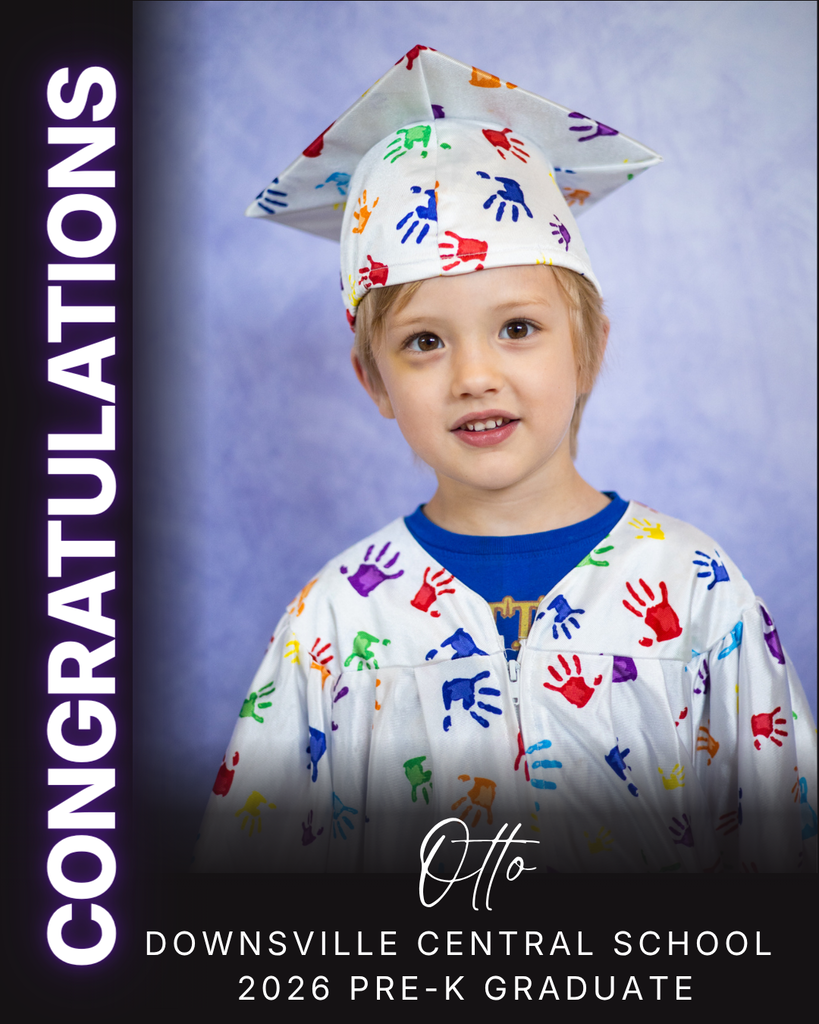 child in cap and gown