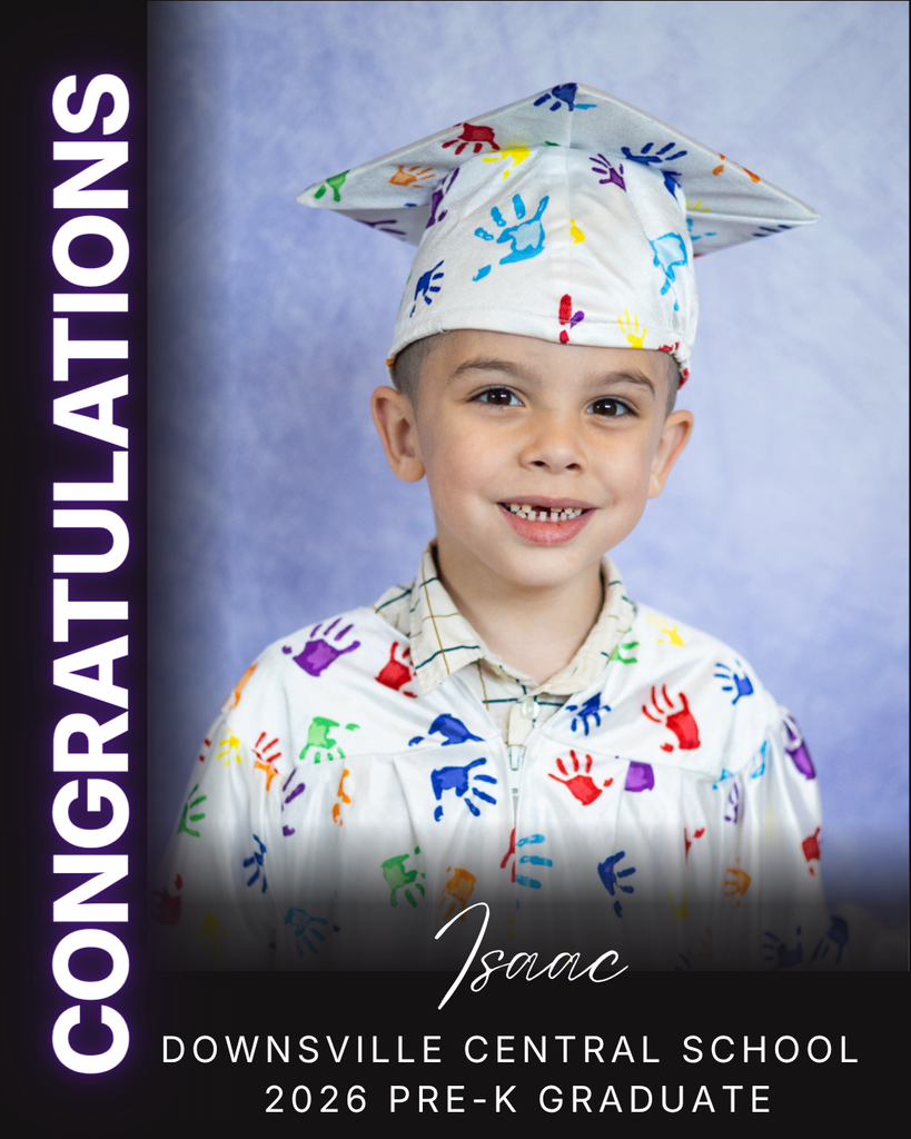 child in cap and gown