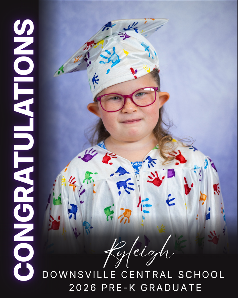 child in cap and gown