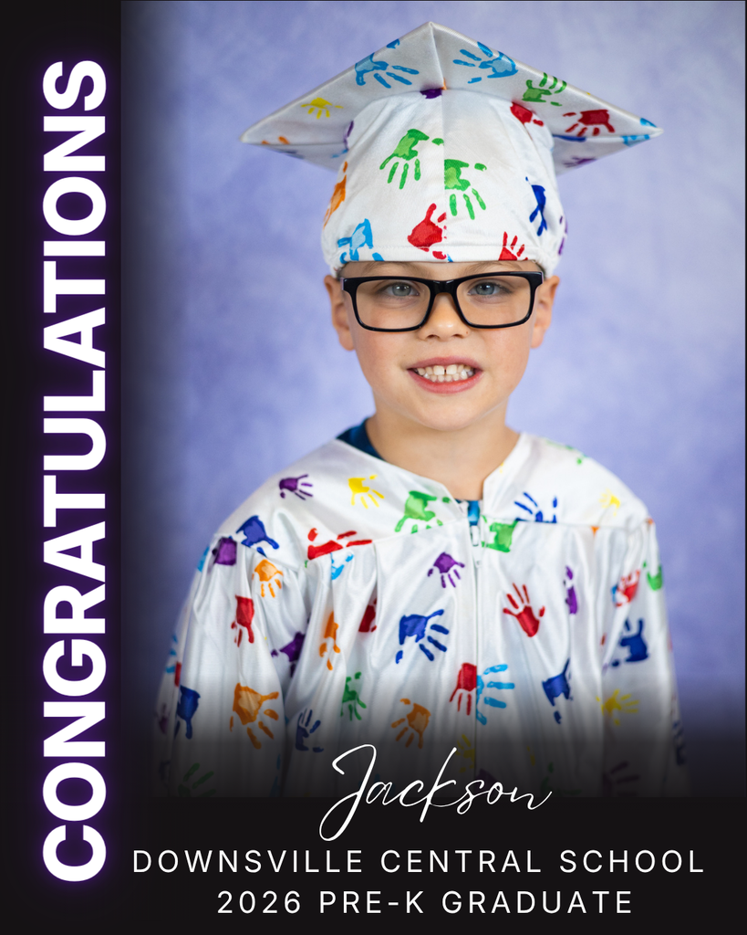 child in cap and gown