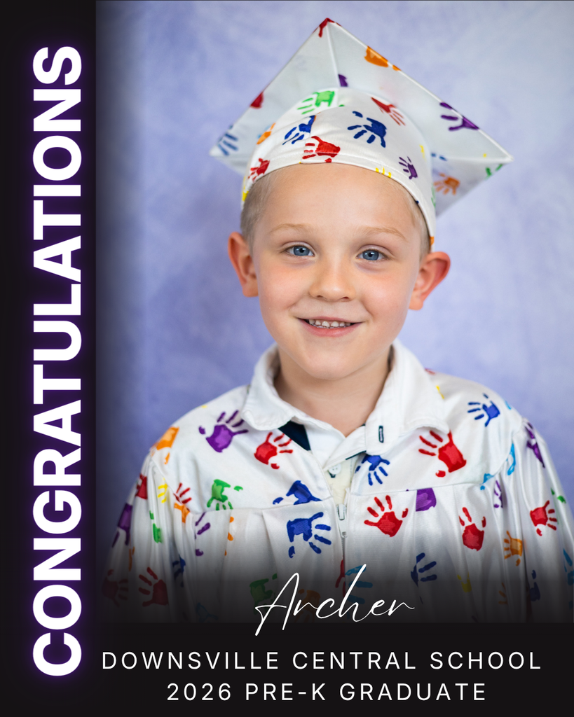 child in cap and gown