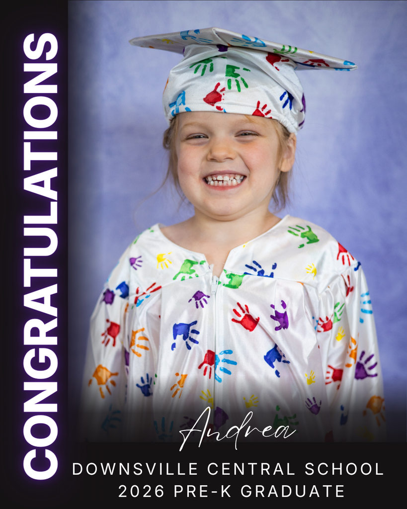 child in cap and gown