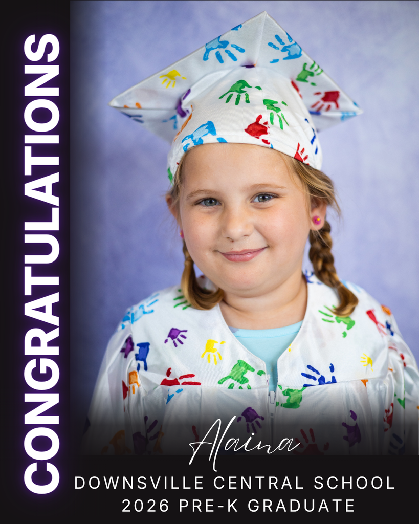 child in cap and gown