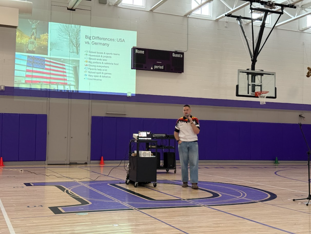 🌍✨ Today our Intermediate students at DES went international! Hawke Gelder, an 11th-grade German exchange student, shared his journey to the USA — from meeting his host family and playing sports, to loving school spirit and discovering new favorite foods 🇺🇸💙 Students asked some GREAT questions and learned that: 🧀 Yes, they do have mac and cheese in Germany 🏓 Table tennis is Hawke’s favorite sport back home ❤️ And while he’s thankful for every experience here, his hometown in Germany is still his favorite place in the world A wonderful reminder of how learning from one another helps us see the world a little bigger. Danke, Hawke, for inspiring us today! 🌟
