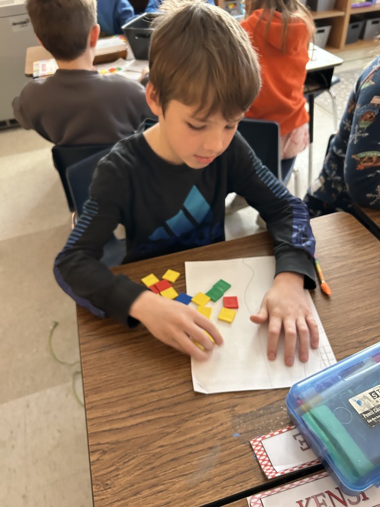 Third graders got hands on today in math by learning all about area