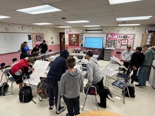 students working in a classroom