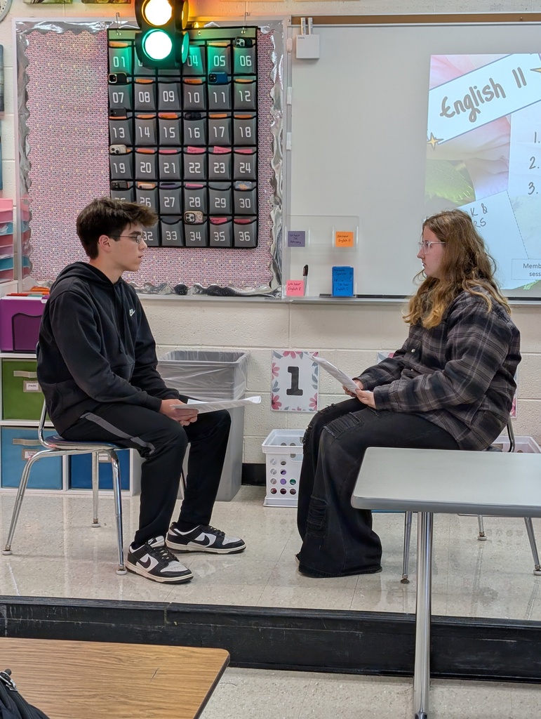 two students participating in a mock job interview