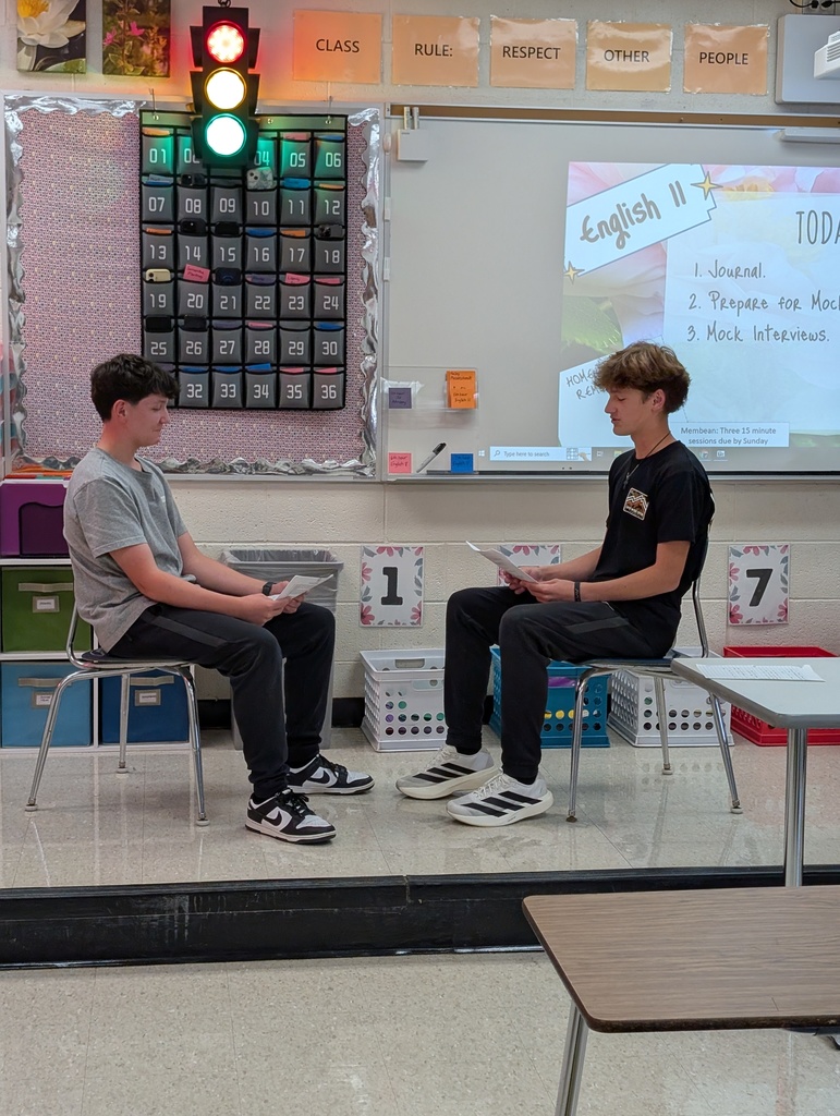 two students participating in a mock job interview