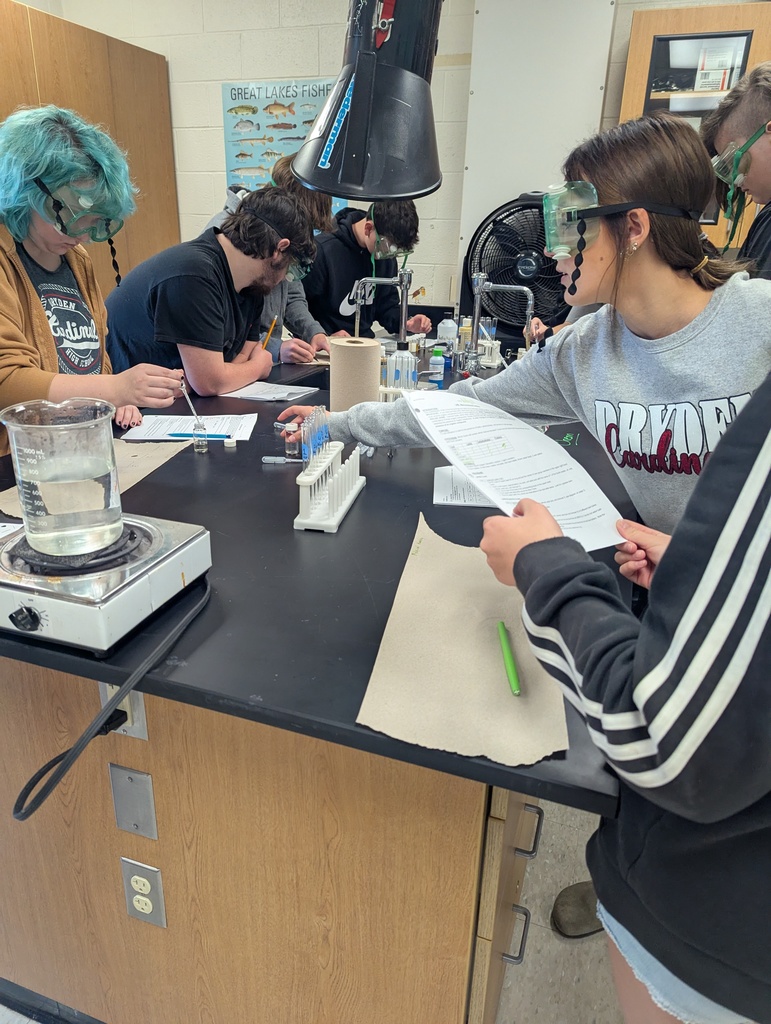 students completing a science experiment