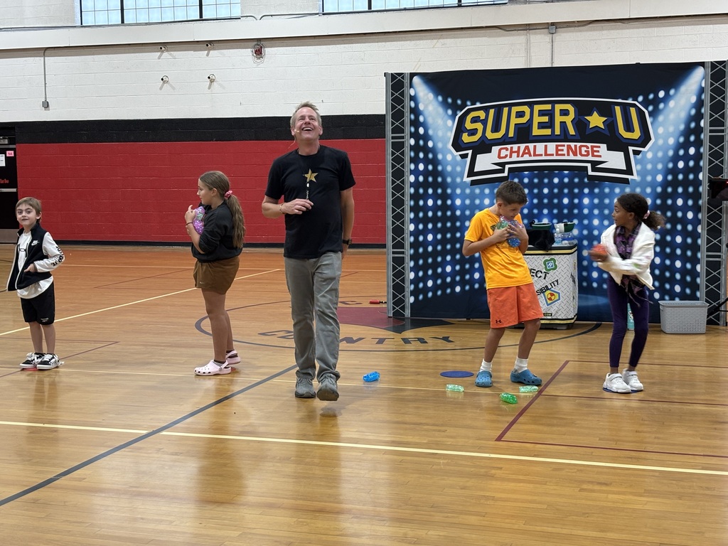 Super U! Challenge is a high-energy, game show-style assembly that teaches students important values like respect, kindness, and responsibility through fun, interactive challenges. Today, we were thrilled to welcome Chris to our school to lead the assembly and bring these powerful messages to life with music, props, and lots of student participation. It was a fun and memorable way to support our character education and anti-bullying efforts!