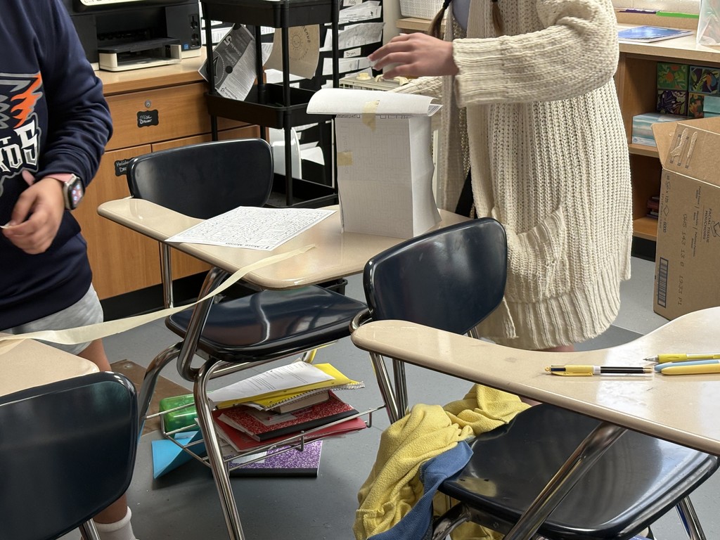 6th grade students are building towers to learn about criteria and constraints. Little do they know, they were given different rubrics, one very vague and the other more detailed. They will all be judged on the same…. The detailed one. This shows how important knowing the criteria and constraints of any project before you start. 