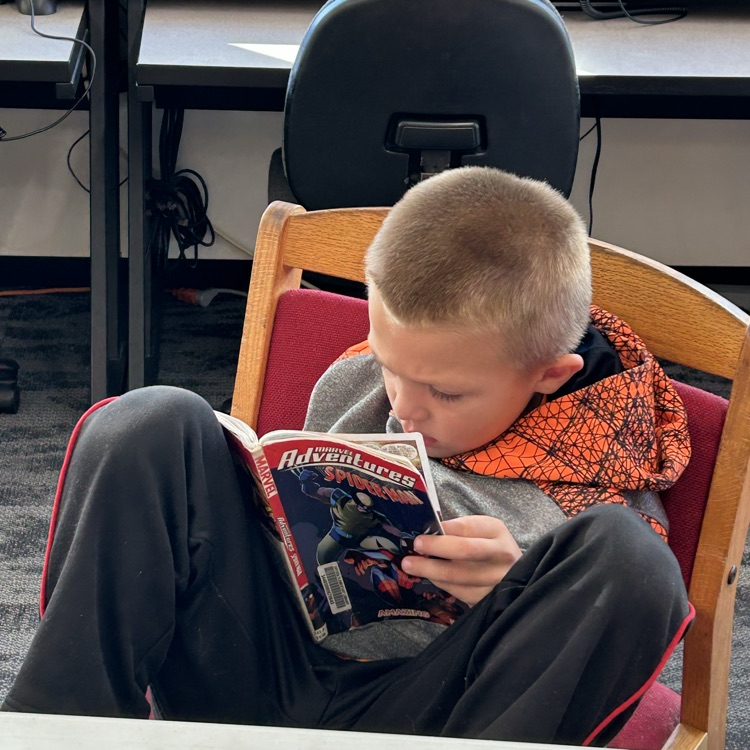 Kindergarten loves picking out their books in the library. #growingreaders #proudcardinal