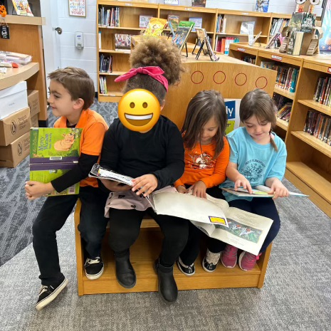 Kindergarten loves picking out their books in the library. #growingreaders #proudcardinal
