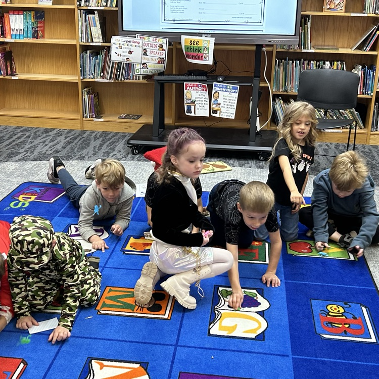 BK read “A Spoonful of Frogs” today and the tried to get their own jumping frogs into the bowl pond and raced their frogs to the finish line too. 🐸 growingreaders #proudcardinal