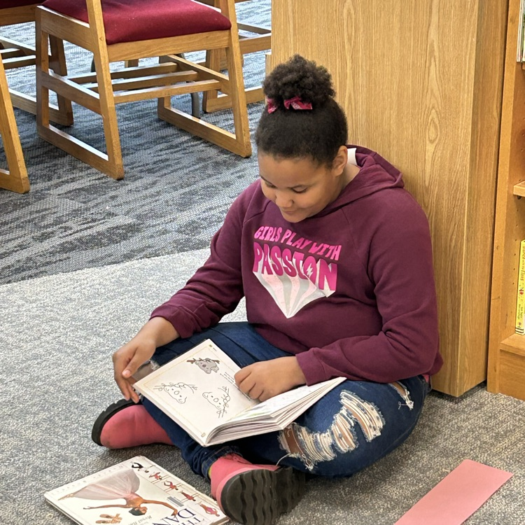 3rd graders found some time to enjoy their books in the library this week. #growingreaders #proudcardinal