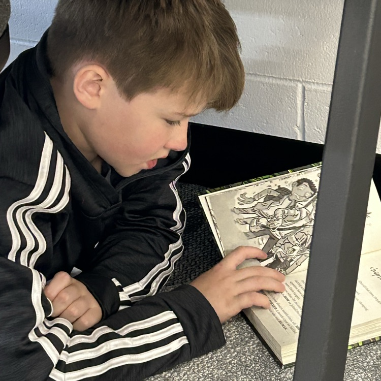 3rd graders found some time to enjoy their books in the library this week. #growingreaders #proudcardinal