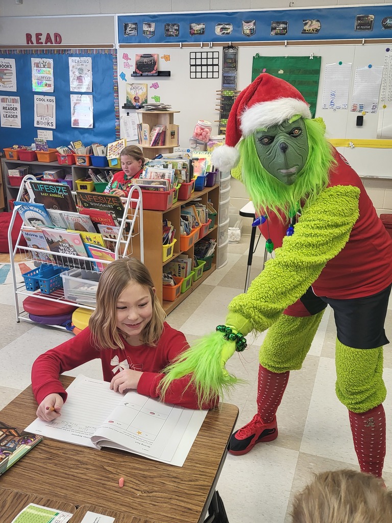 The Grinch visited Mrs. Raymer's 2nd grade classroom. #proudcardinal