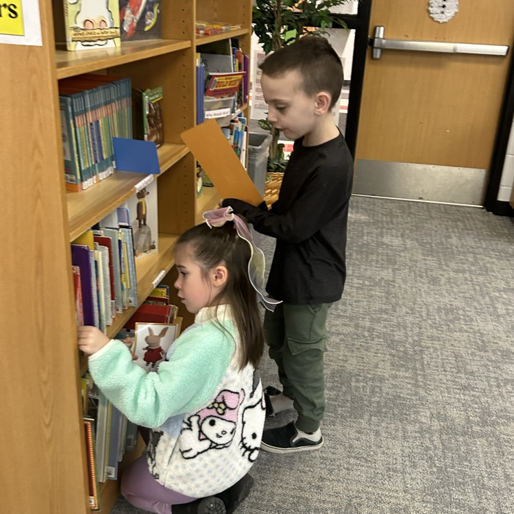1st graders went on a scavenger hunt today to learn the shelf location of popular book characters. #growingreaders #proudcardinal