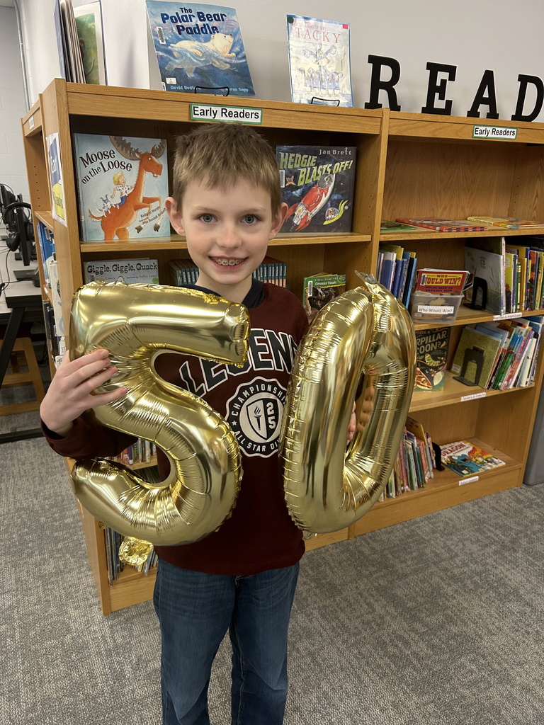Working our way to 500 Books Before Middle School...and Kyle hit the 100 tier level which earned him a coin for the book vending machine.  #growingreaders #proudcardinal