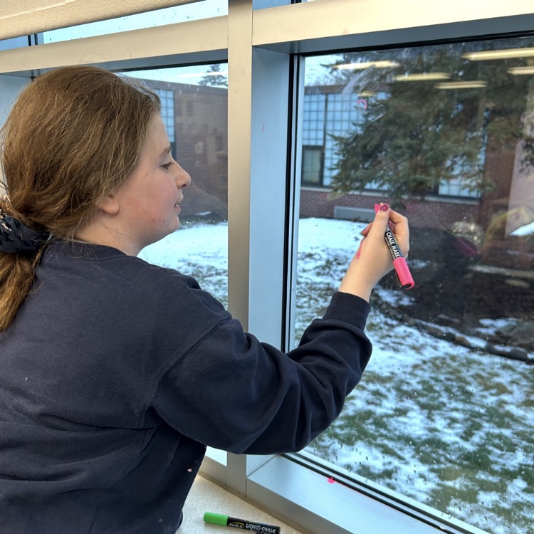 The Student Library Board spent time this week designing winter messages for our library windows.  #proudcardinal