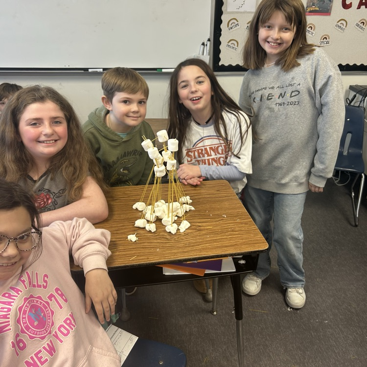 Yesterday, 4th graders competed in teams to design structures that could survive earthquakes, and each team succeeded!  The tallest structure was 63.5 mm.