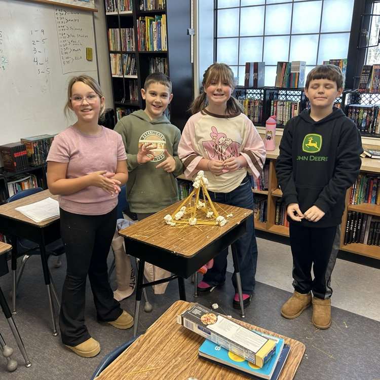 Yesterday, 4th graders competed in teams to design structures that could survive earthquakes, and each team succeeded!  The tallest structure was 63.5 mm.