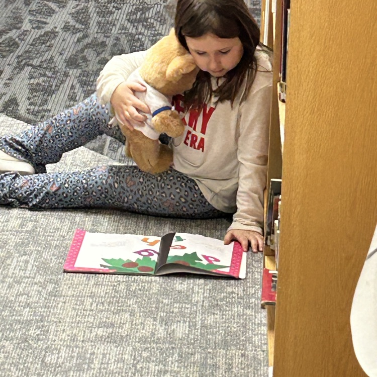 1st graders grabbed a bear buddy this week in the library and read to  it. #growingreaders #proudcardinal
