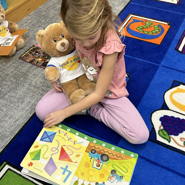 1st graders grabbed a bear buddy this week in the library and read to  it. #growingreaders #proudcardinal