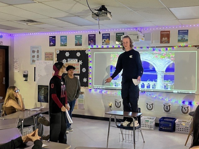 ninth grade students performing the Romeo and Juliet balcony scene in a classroom