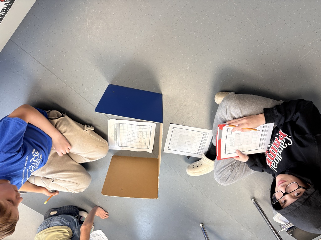 Mrs. Howell’s 6th graders are preparing to read the 4th book in the Percy Jackson Series, which is called The Battle of the Labyrinth. They spent the day battling it out Battleship style with a game where one student plays the Minotaur who has placed walls and traps for the other person to avoid as Theseus, who is trying to get to the potions and sword that were stashed around the Labyrinth. Students are using skill and strategy as they venture deep into the unknown!