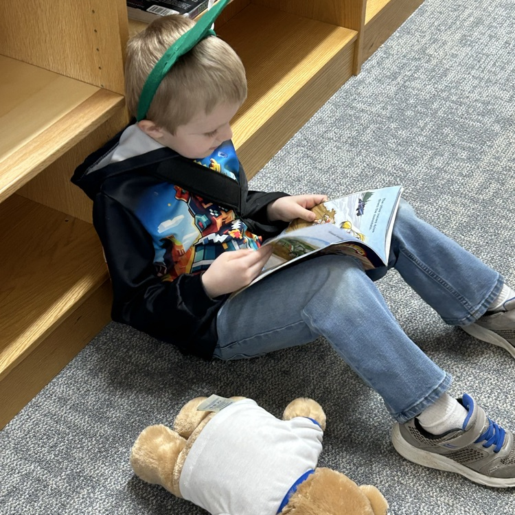 1st grade met their bear reading buddies today and talked through a picture walk or read to them. #growingreaders #proudcardinal