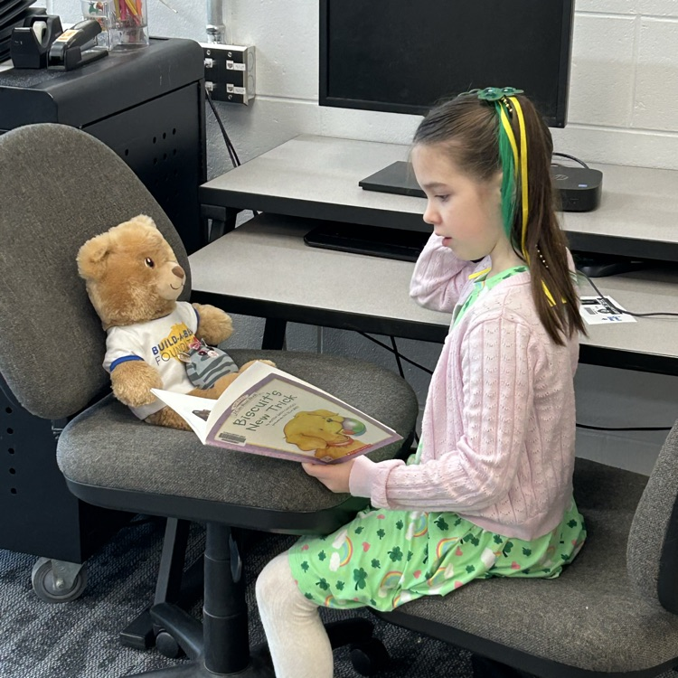 1st grade met their bear reading buddies today and talked through a picture walk or read to them. #growingreaders #proudcardinal