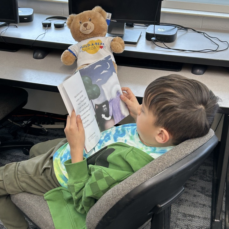 1st grade met their bear reading buddies today and talked through a picture walk or read to them. #growingreaders #proudcardinal