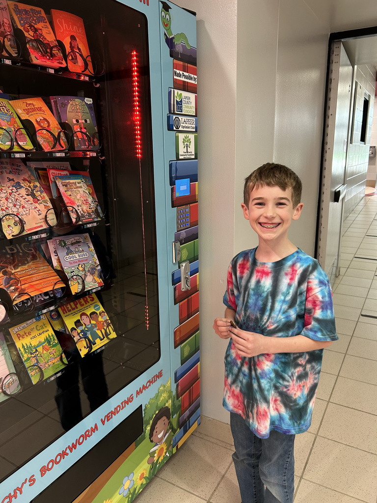 Henry was all smiles today as he received his Cardinal Coin today for the book vending machine.  This week he hit the 100 tier in the 500 Books Before Middle School Challenge.  #proudcardinal #growingreaders