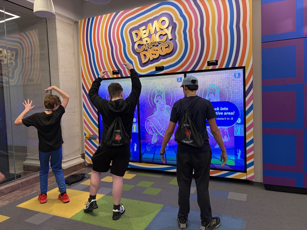 students playing a virtual disco game