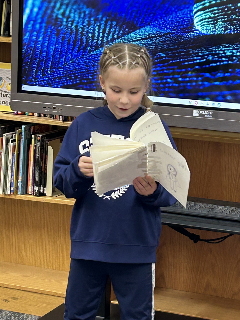 Our new Aspiring Author is Grace from the 3rd grade.  She shared her book Weather Girl with the class today and it will soon be a part of our library collection. #growingreaders  #proudcardinal