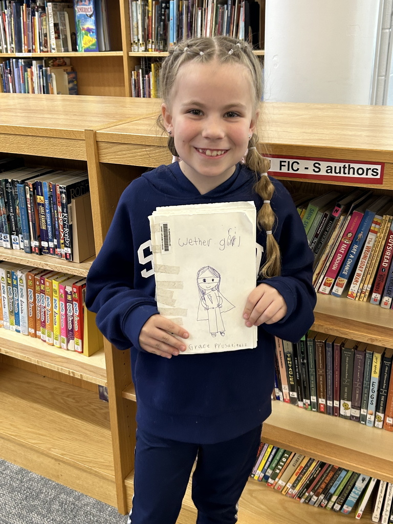 Our new Aspiring Author is Grace from the 3rd grade.  She shared her book Weather Girl with the class today and it will soon be a part of our library collection. #growingreaders  #proudcardinal