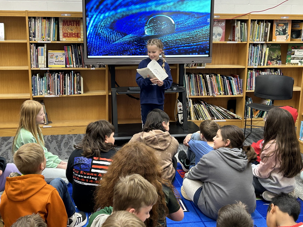 Our new Aspiring Author is Grace from the 3rd grade.  She shared her book Weather Girl with the class today and it will soon be a part of our library collection. #growingreaders  #proudcardinal