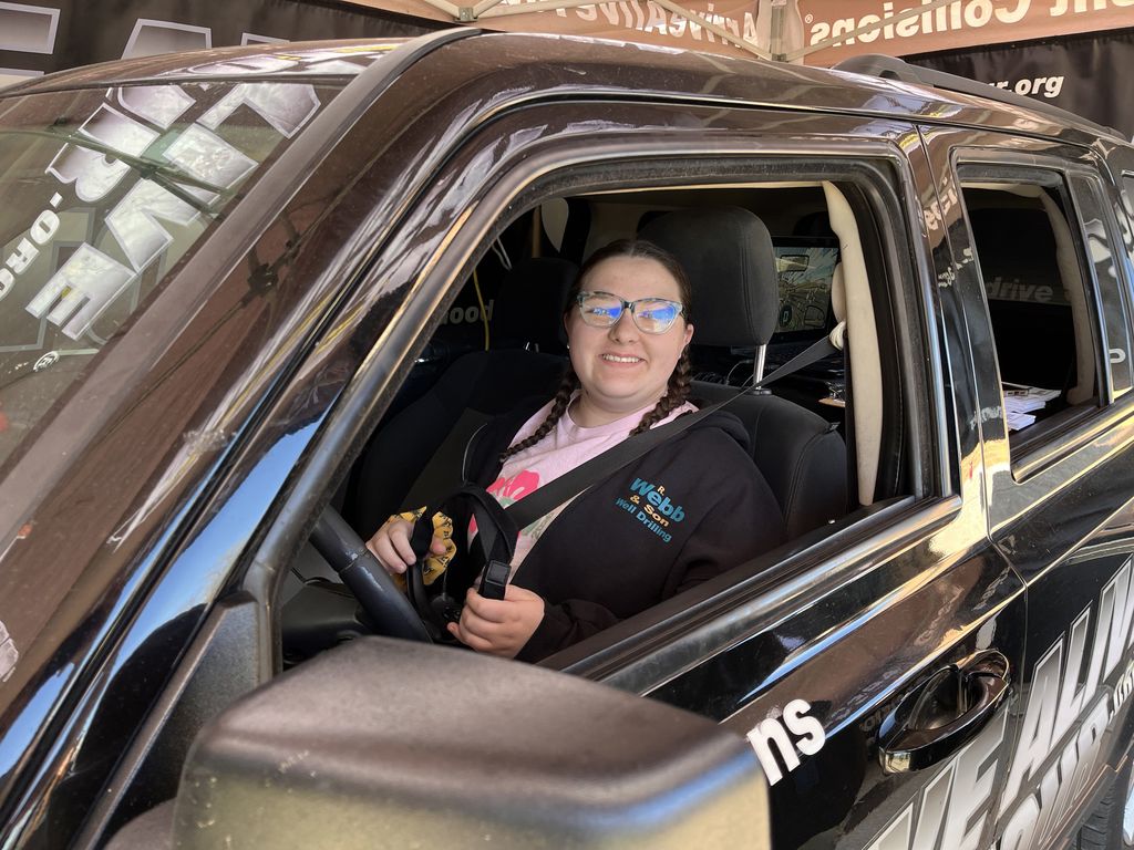 student in driving simulator