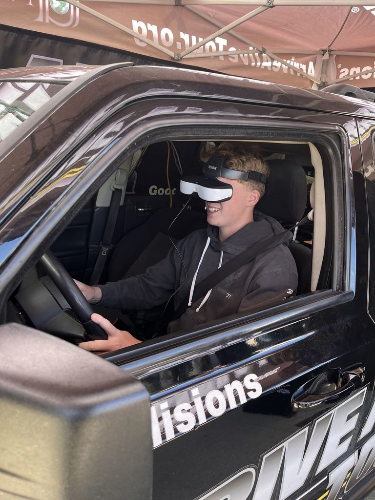 student in driving simulator