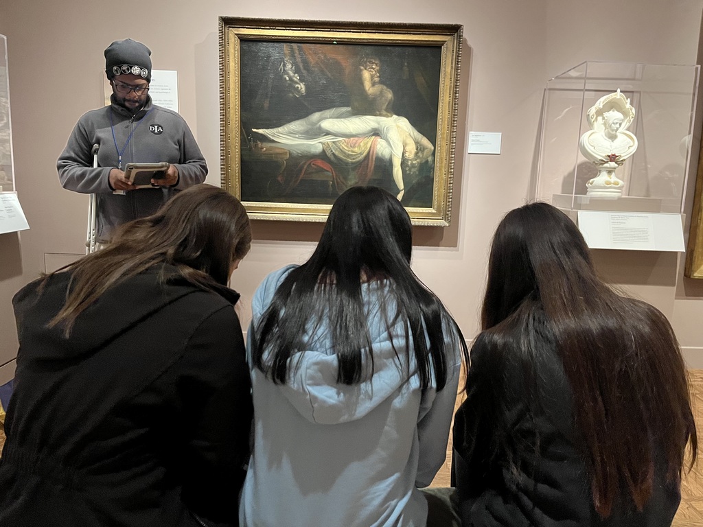 students touring an art museum