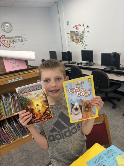 Students in Mrs. Calvert’s class learned about Mrs. Knox’s summer reading challenge and got to shop for their summer take-home books.