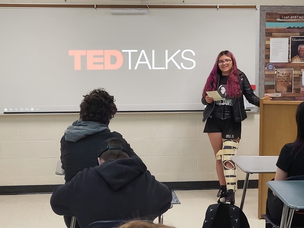 8th grade student giving a presentation
