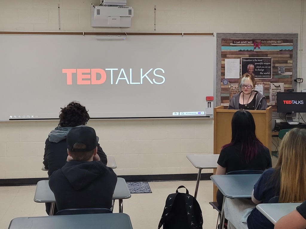 8th grade student giving a presentation